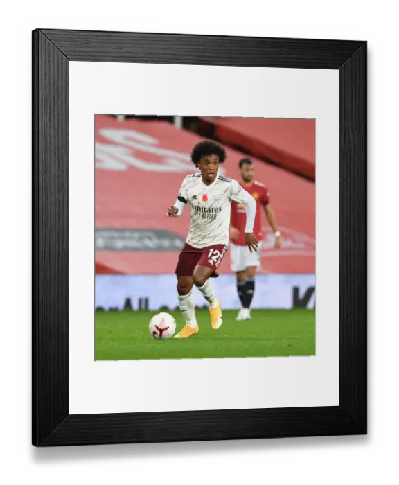 Framed Print : Behind Closed Doors: Willian at Empty Old Trafford - Manchester United vs Arsenal (2020-21) Framed Print : Behind Closed Doors: Willian at Empty Old Trafford - Manchester United vs Arsenal (2020-21)