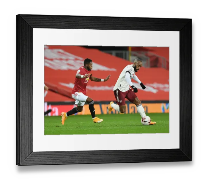 Framed Print : Alex Lacazette Breaks Past Fred: Manchester United vs. Arsenal, 2020-21 Premier League