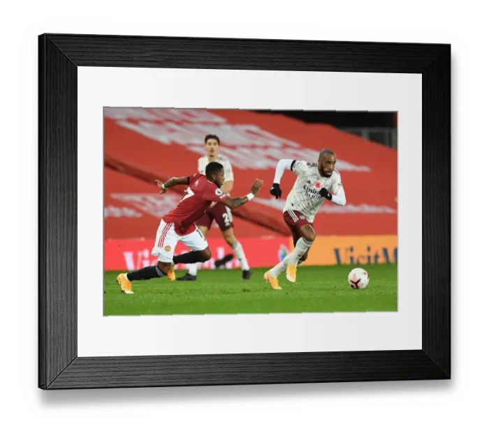 Framed Print : Alexis Lacazette's Brilliant Maneuver: Outsmarting Fred at Old Trafford, Arsenal's Flashes of Genius in the 2020-21 Premier League Framed Print : Alexis Lacazette's Brilliant Maneuver: Outsmarting Fred at Old Trafford, Arsenal's Flashes of Genius in the 2020-21 Premier League