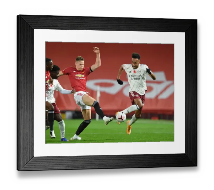 Framed Print : Aubameyang's Sneaky Move: Arsenal's Star Outwits McTominay in Manchester United vs. Arsenal, 2020-21 Premier League