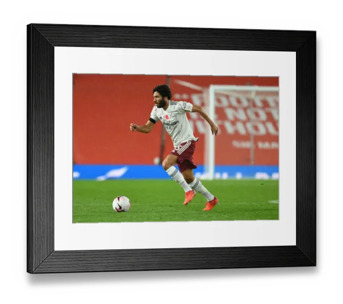 Framed Print : Arsenal's Mo Elneny at Empty Old Trafford: 2020-21 Premier League Showdown Between Arsenal and Manchester United Framed Print : Arsenal's Mo Elneny at Empty Old Trafford: 2020-21 Premier League Showdown Between Arsenal and Manchester United