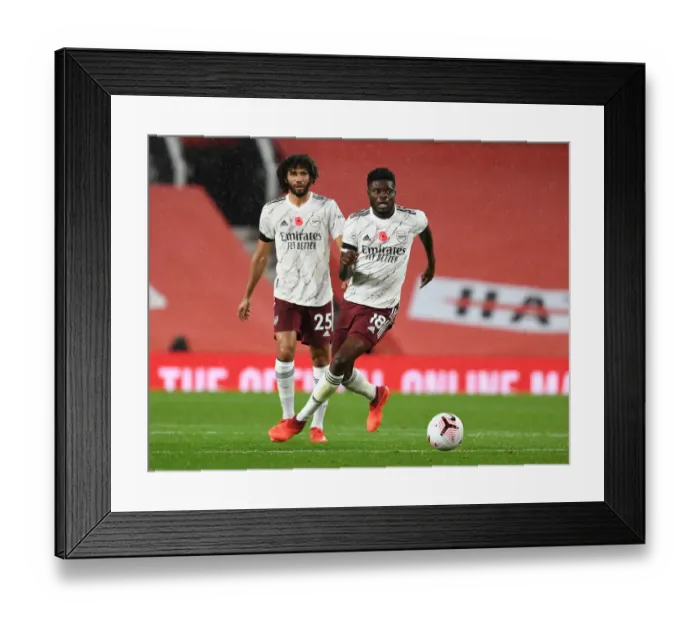 Framed Print : Thomas Partey in Action: Arsenal vs Manchester United, Premier League 2020-21 (Behind Closed Doors) Framed Print : Thomas Partey in Action: Arsenal vs Manchester United, Premier League 2020-21 (Behind Closed Doors)