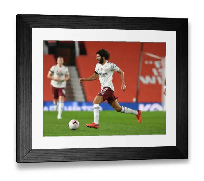 Framed Print : Arsenal's Mo Elneny at Empty Old Trafford: 2020-21 Premier League Clash Between Manchester United and Arsenal