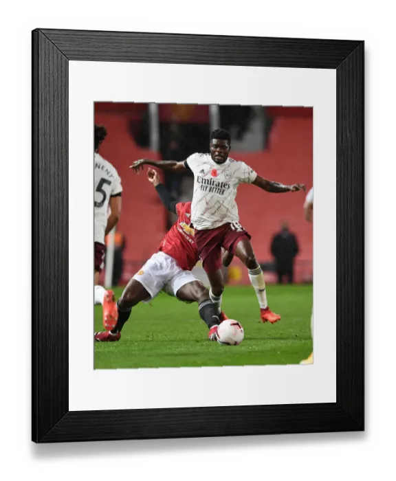 Framed Print : Partey Foul: Manchester United vs. Arsenal, Premier League Clash Amidst Pandemic Framed Print : Partey Foul: Manchester United vs. Arsenal, Premier League Clash Amidst Pandemic