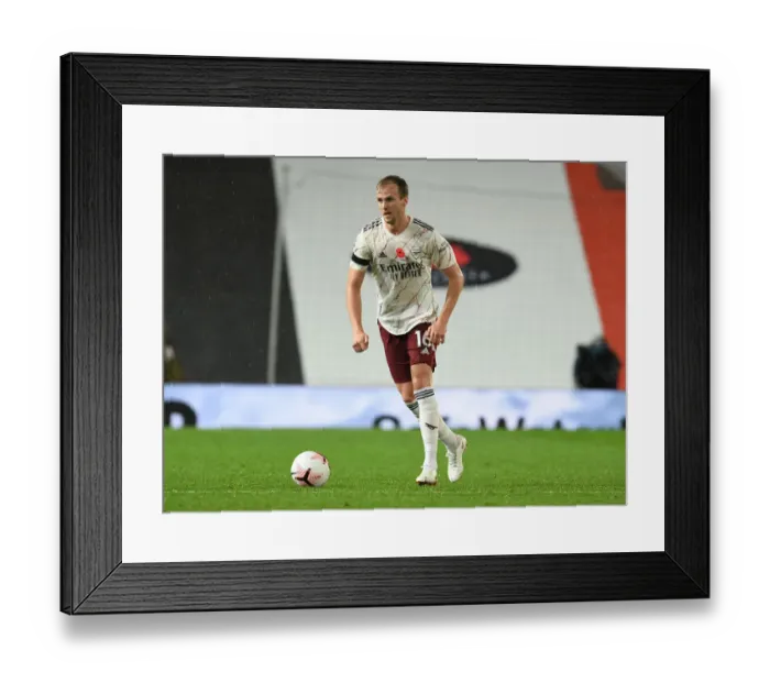 Framed Print : Arsenal's Rob Holding at Old Trafford: Manchester United vs Arsenal, 2020-21 Premier League (Behind Closed Doors)