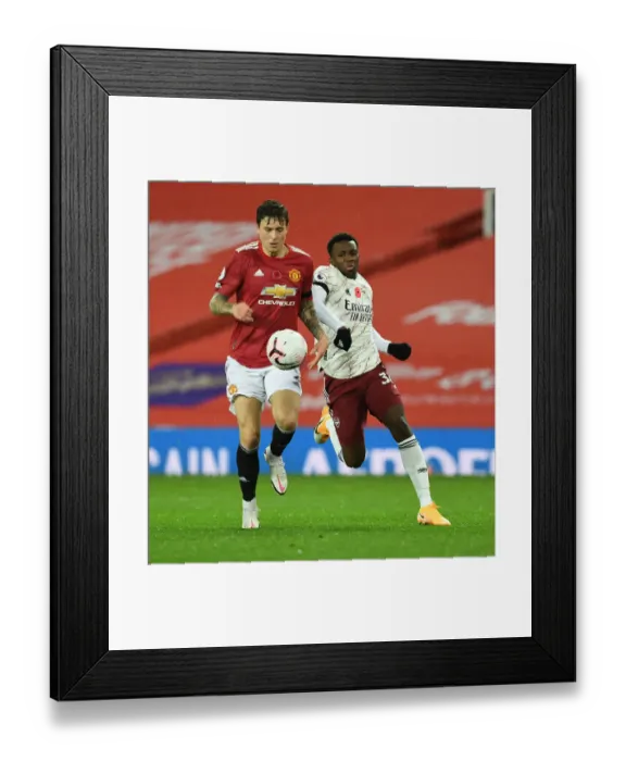 Framed Print : Empty Old Trafford: Nketiah vs Lindelof Showdown - Premier League 2020-21