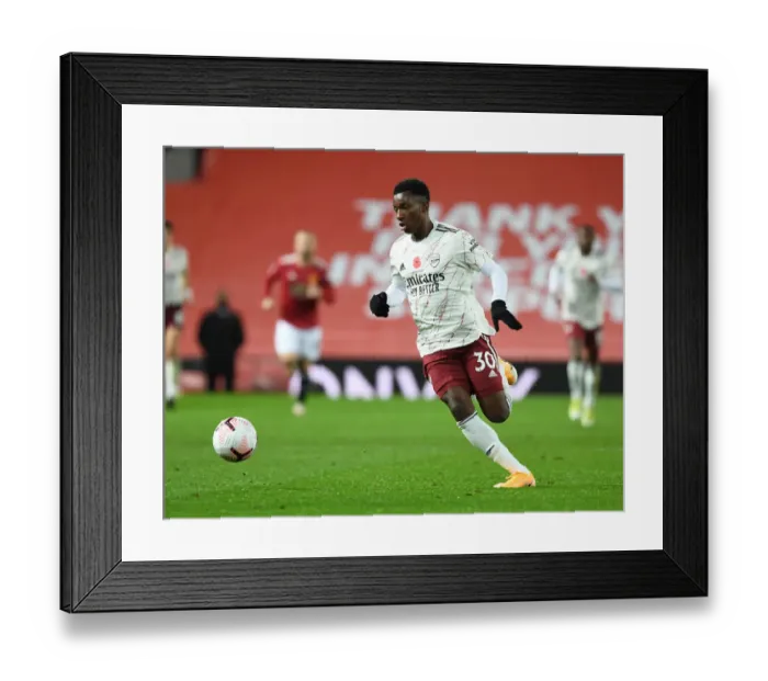 Framed Print : Arsenal's Eddie Nketiah at Manchester United's Old Trafford: Premier League Clash Amidst COVID-19 Restrictions (2020-21)