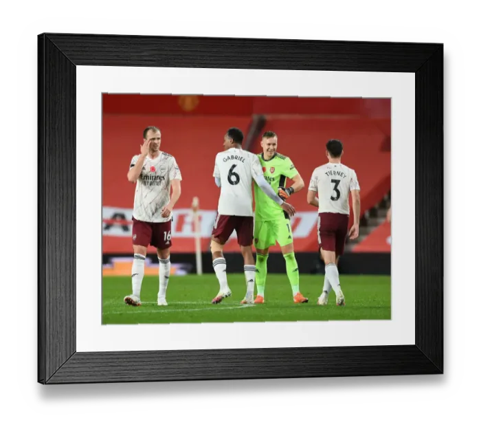 Framed Print : Arsenal Players Unite at Empty Old Trafford: Manchester United vs Arsenal, 2020-21 Premier League Framed Print : Arsenal Players Unite at Empty Old Trafford: Manchester United vs Arsenal, 2020-21 Premier League