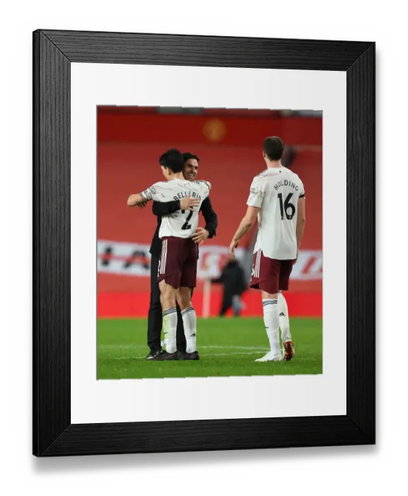 Framed Print : Arteta and Bellerin: Arsenal's Victory at Old Trafford Amidst Empty Stands (Manchester United vs Arsenal, 2020-21)