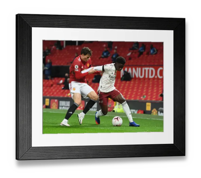 Framed Print : Bukayo Saka vs. Victor Lindelof: Manchester United vs. Arsenal, Premier League 2020-21