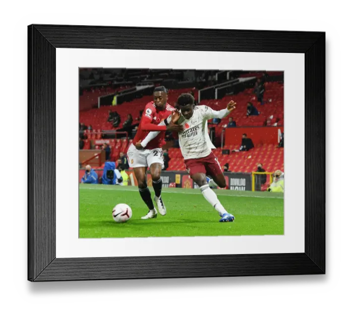 Framed Print : Empty Old Trafford: Saka vs Wan-Bissaka - Premier League Showdown (2020-21)