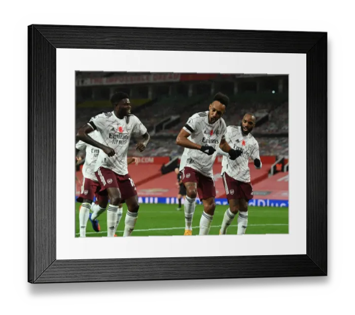 Framed Print : Arsenal's Triumphant Three: Aubameyang, Partey, Lacazette Celebrate Goal at Empty Old Trafford (2020-21)