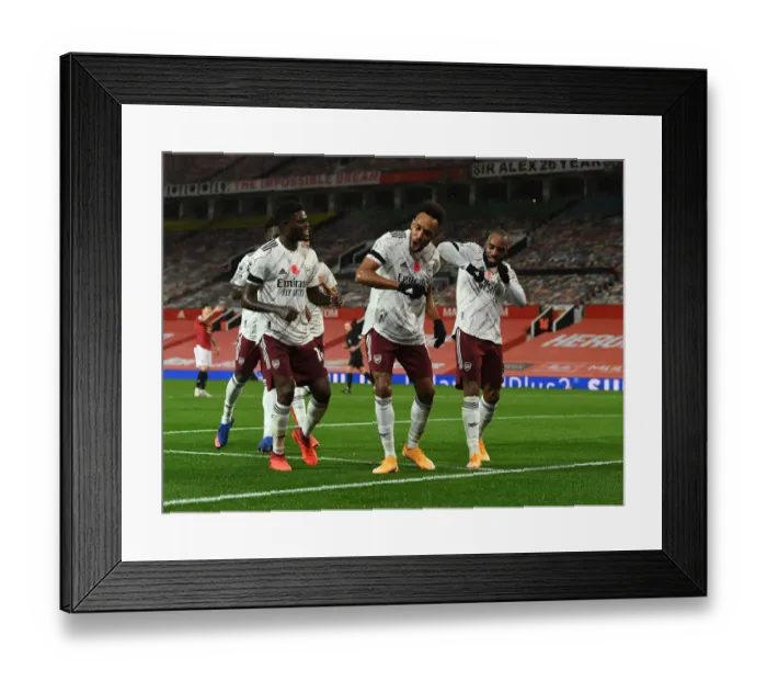 Framed Print : Arsenal's Triumphant Threesome: Aubameyang, Partey, Lacazette Celebrate Goal at Empty Old Trafford (2020-21)