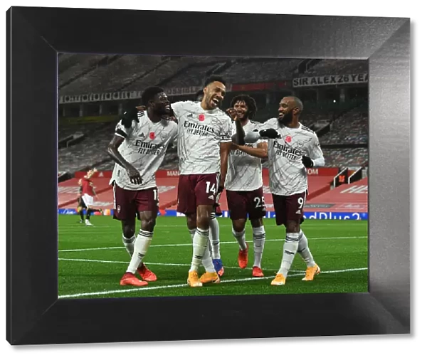 Triumphant Threesome: Aubameyang, Partey, and Lacazette's Goal Celebration - Manchester United vs Arsenal (2020-21)