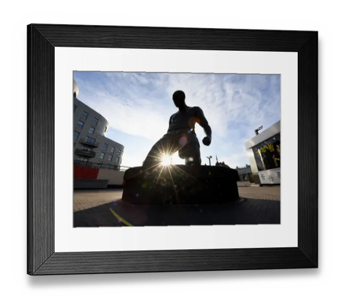 Framed Print : Thierry Henry's Enduring Legacy: A Statue Amidst Europa League Action at Arsenal's Emirates Stadium Framed Print : Thierry Henry's Enduring Legacy: A Statue Amidst Europa League Action at Arsenal's Emirates Stadium