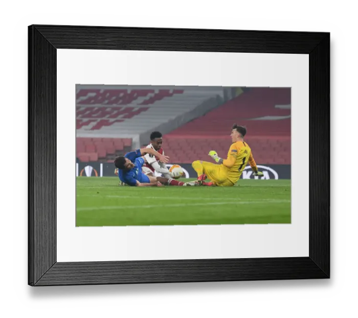 Framed Print : Arsenal's Own Goal Secures Victory Over Molde in Europa League Framed Print : Arsenal's Own Goal Secures Victory Over Molde in Europa League