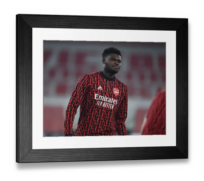 Framed Print : Thomas Partey Gears Up: Arsenal FC vs Molde FK, UEFA Europa League 2020-21 Framed Print : Thomas Partey Gears Up: Arsenal FC vs Molde FK, UEFA Europa League 2020-21