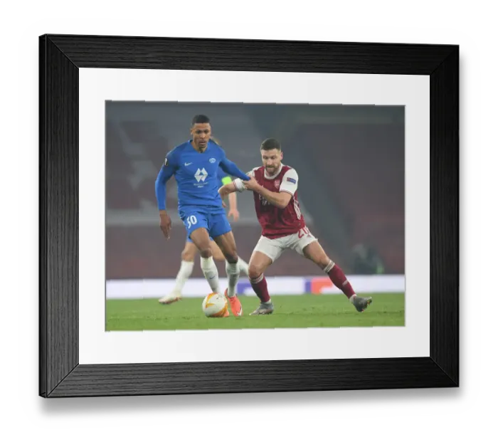 Framed Print : Mustafi vs. Bolly: Intense Europa League Showdown between Arsenal and Molde Framed Print : Mustafi vs. Bolly: Intense Europa League Showdown between Arsenal and Molde