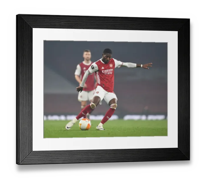 Framed Print : Arsenal's Ainsley Maitland-Niles in Action during Europa League Clash against Molde Framed Print : Arsenal's Ainsley Maitland-Niles in Action during Europa League Clash against Molde