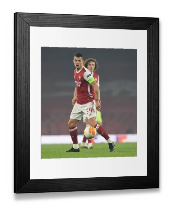 Framed Print : Granit Xhaka in Action: Arsenal's Europa League Clash against Molde FK Framed Print : Granit Xhaka in Action: Arsenal's Europa League Clash against Molde FK