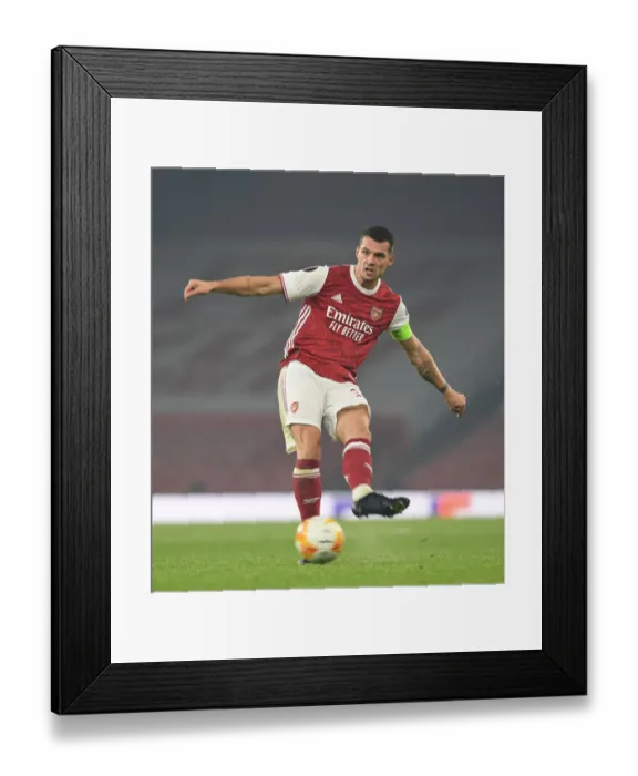 Framed Print : Granit Xhaka in Action: Arsenal's Europa League Battle against Molde FK