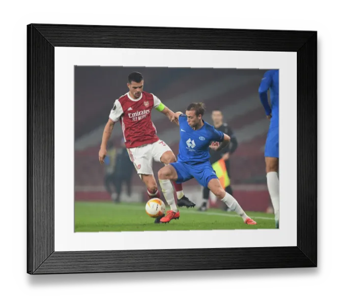 Framed Print : Xhaka vs Ellingsen: Battle in the Europa League - Arsenal vs Molde