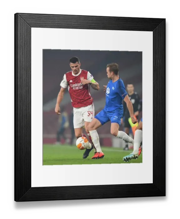 Framed Print : Xhaka vs Ellingsen: A Europa League Showdown - Arsenal vs Molde Framed Print : Xhaka vs Ellingsen: A Europa League Showdown - Arsenal vs Molde