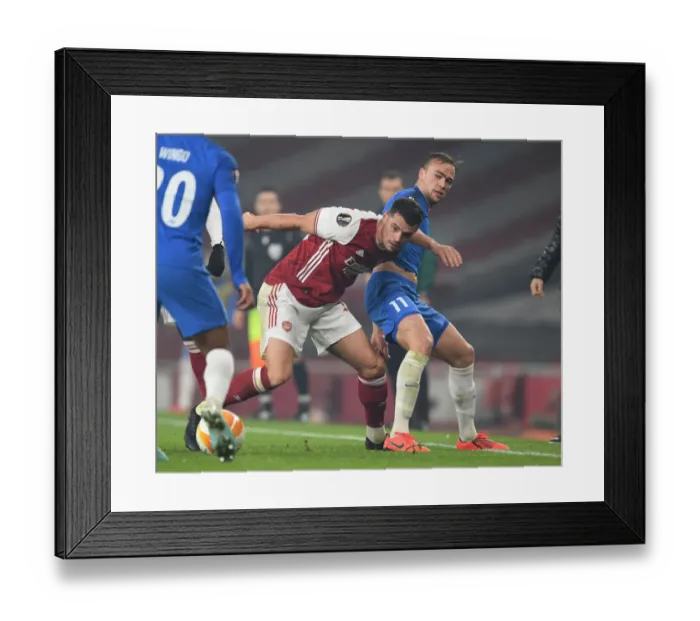 Framed Print : Arsenal vs Molde: Xhaka Clashes with Ellingsen in Europa League Showdown Framed Print : Arsenal vs Molde: Xhaka Clashes with Ellingsen in Europa League Showdown