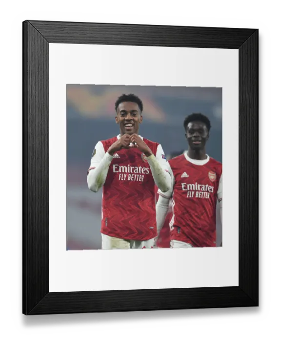 Framed Print : Arsenal: Joe Willock and Bukayo Saka Celebrate Goals in Europa League Victory