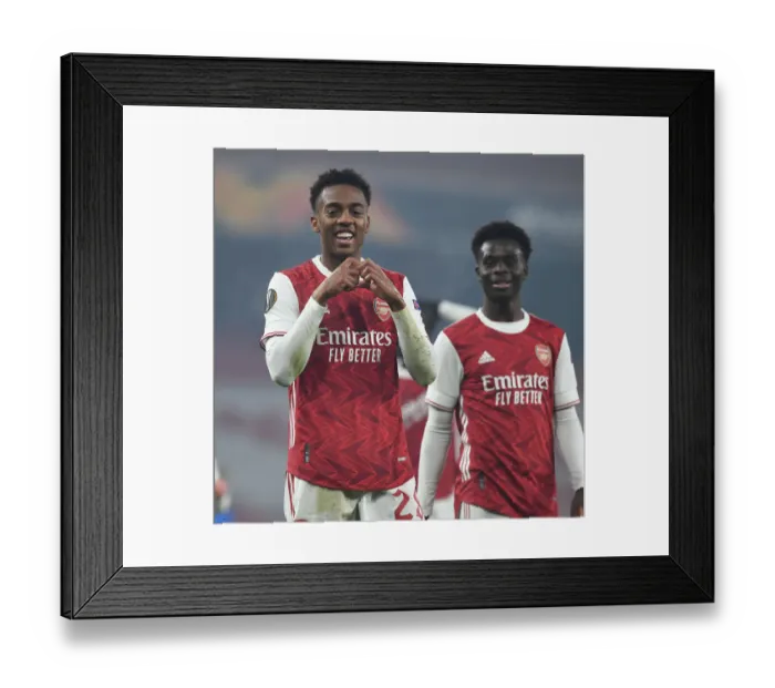 Framed Print : Arsenal's Willock and Saka Celebrate Goals in Europa League Victory over Molde