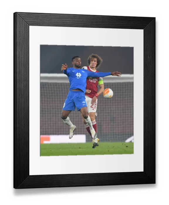 Framed Print : Arsenal vs Molde: David Luiz Clashes with Leke James in Europa League Showdown Framed Print : Arsenal vs Molde: David Luiz Clashes with Leke James in Europa League Showdown