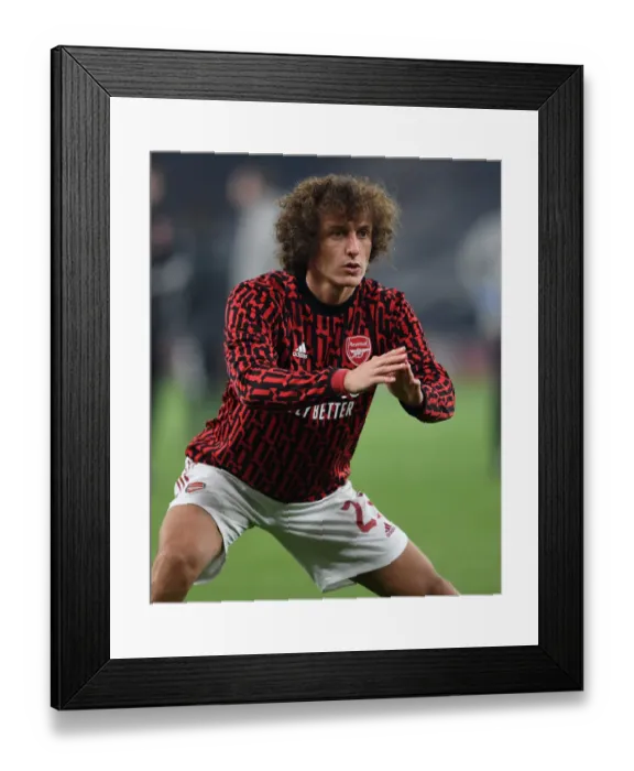 Framed Print : Arsenal FC vs Molde FK: David Luiz Warms Up Ahead of UEFA Europa League Clash