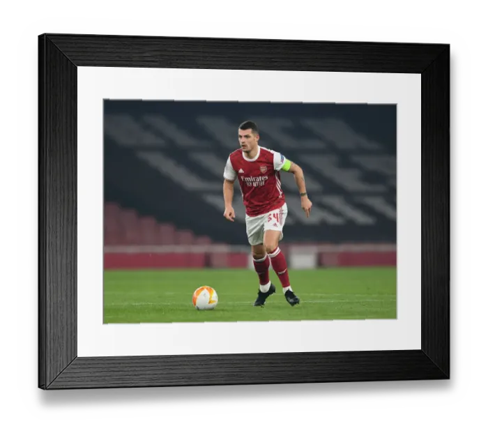Framed Print : Granit Xhaka in Action: Arsenal's Europa League Battle against Molde FK