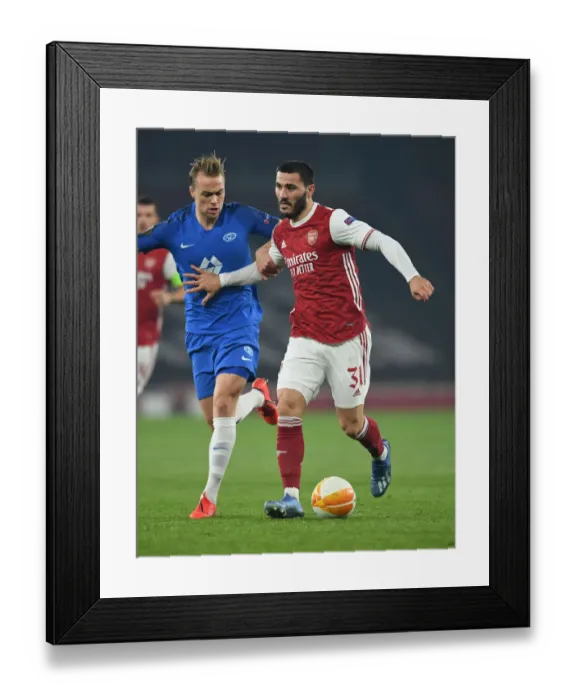 Framed Print : Arsenal vs Molde: Kolasinac Clashes with Ellingsen in UEFA Europa League Showdown