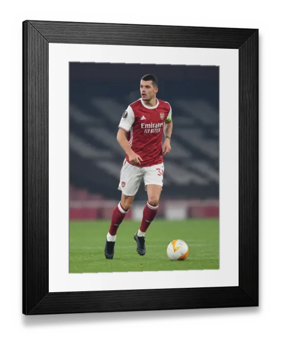 Framed Print : Granit Xhaka's Europa League Victory: Arsenal's Triumph over Molde FK, 2020-21 Framed Print : Granit Xhaka's Europa League Victory: Arsenal's Triumph over Molde FK, 2020-21