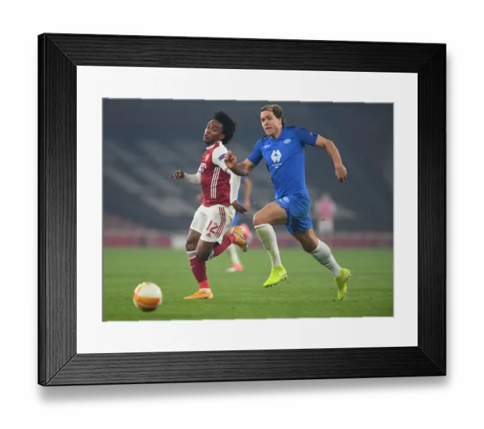 Framed Print : Arsenal vs Molde: Willian Clashes with Bjornbak in Europa League Showdown
