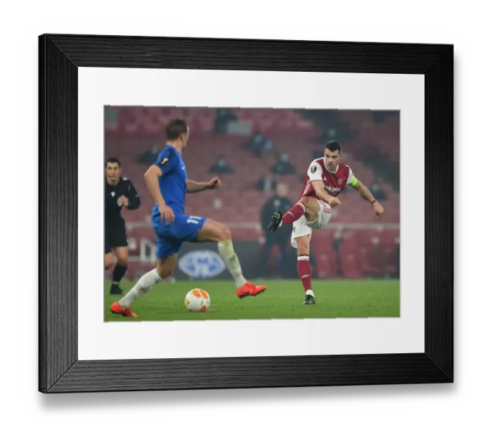 Framed Print : Granit Xhaka in Action: Arsenal's Europa League Battle against Molde FK