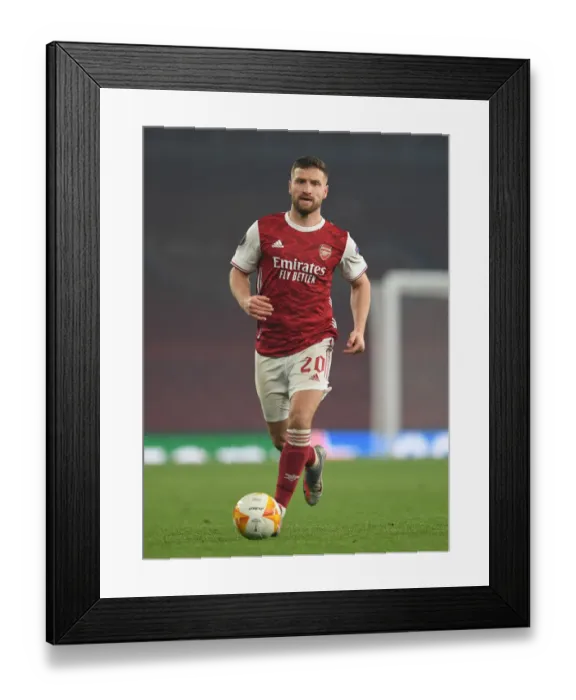 Framed Print : Arsenal's Mustafi in Action against Molde in Europa League Group Stage