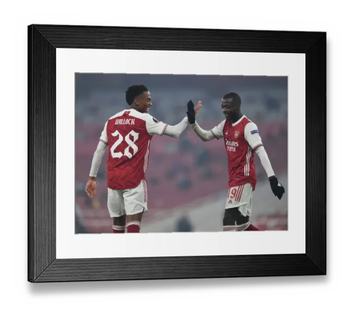 Framed Print : Arsenal's Nicolas Pepe and Joe Willock Celebrate Goals Against Molde in Europa League