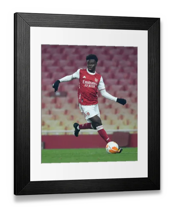 Framed Print : Arsenal's Bukayo Saka in Action against Molde FK in Europa League Group Stage Framed Print : Arsenal's Bukayo Saka in Action against Molde FK in Europa League Group Stage