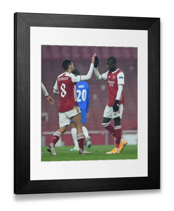 Framed Print : Arsenal's Nicolas Pepe Scores Third Goal vs Molde FK in Europa League Match