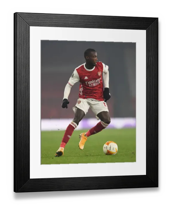 Framed Print : Arsenal's Nicolas Pepe in Action: Europa League 2020-21 - Arsenal vs Molde FK