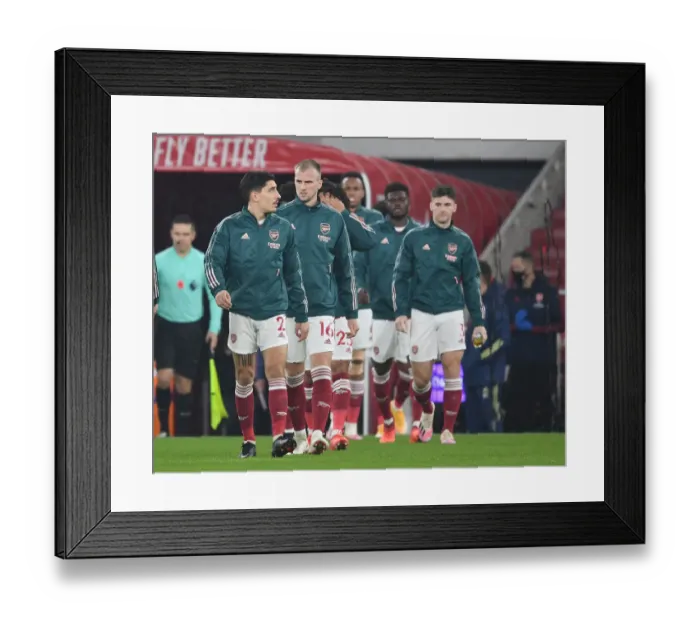 Framed Print : Arsenal Players Hector Bellerin, Rob Holding, and Kieran Tierney Prepare for Arsenal v Aston Villa in Empty Emirates Stadium (2020-21)