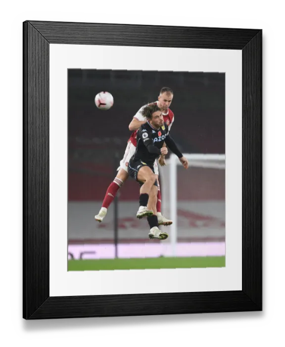 Framed Print : Holding vs Grealish: A Battle at Empty Emirates - Premier League Showdown between Arsenal and Aston Villa, 2020-21 Framed Print : Holding vs Grealish: A Battle at Empty Emirates - Premier League Showdown between Arsenal and Aston Villa, 2020-21