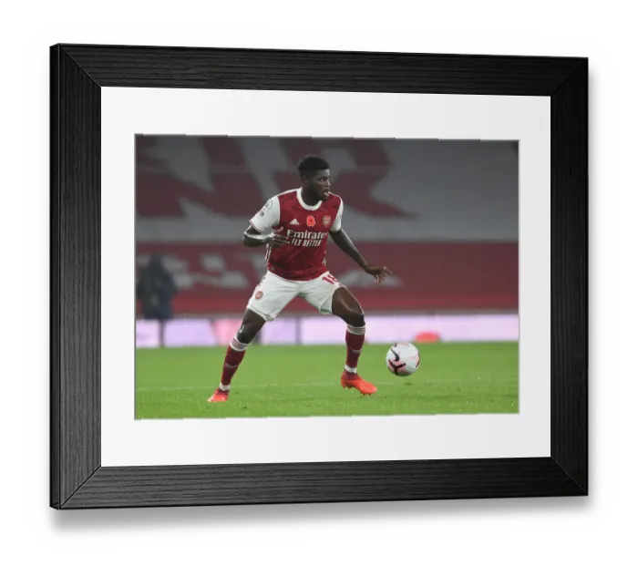 Framed Print : Arsenal's Kieran Tierney in Action: 2020-21 Premier League Match vs. Aston Villa (Behind Closed Doors)