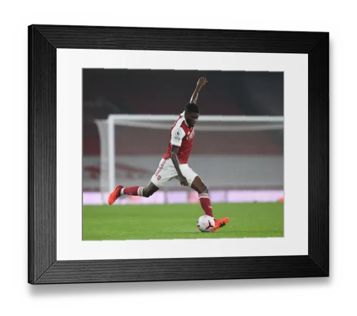 Framed Print : Arsenal's Kieran Tierney in Action: 2020-21 Premier League Match at Emirates Stadium (Behind Closed Doors)