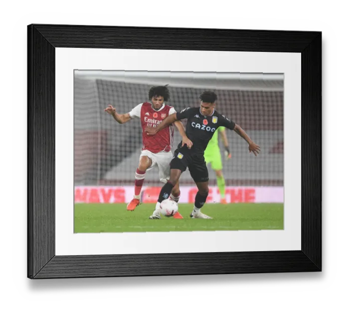 Framed Print : Arsenal vs Aston Villa: Clash at Emirates Stadium Amidst Pandemic Restrictions