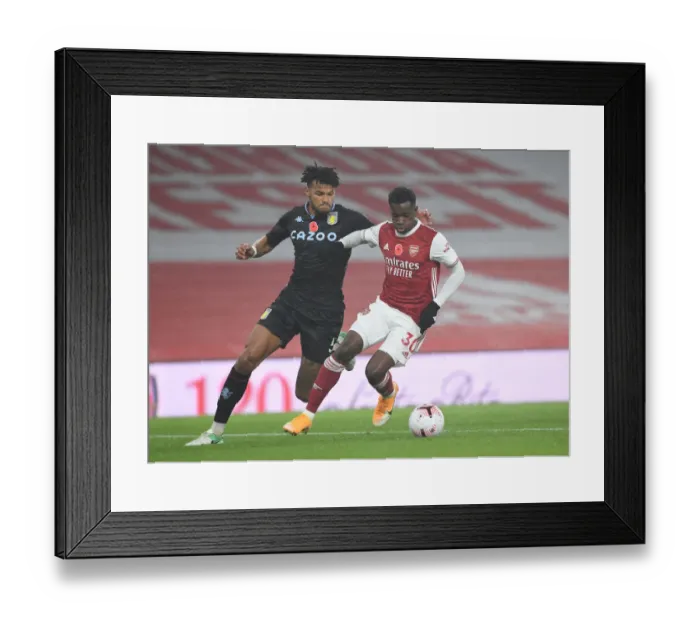 Framed Print : Arsenal vs Aston Villa: Nketiah vs Mings - Premier League Showdown Amidst Empty Stands (November 2020)