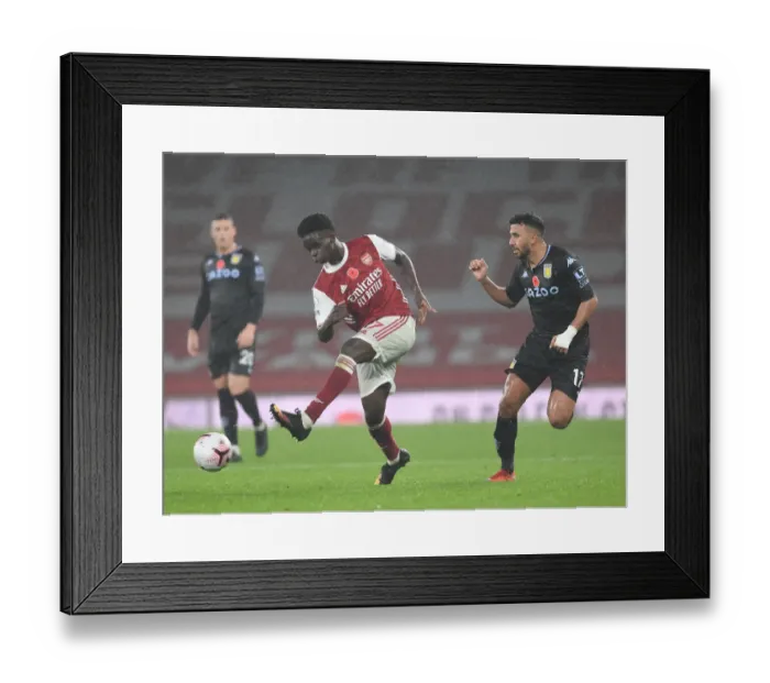 Framed Print : Arsenal vs Aston Villa: Bukayo Saka in Action at Empty Emirates Stadium, Premier League 2020-21