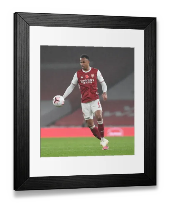 Framed Print : Gabriel in Action: Empty Emirates Stadium Clash - Arsenal vs. Aston Villa, Premier League 2020-21